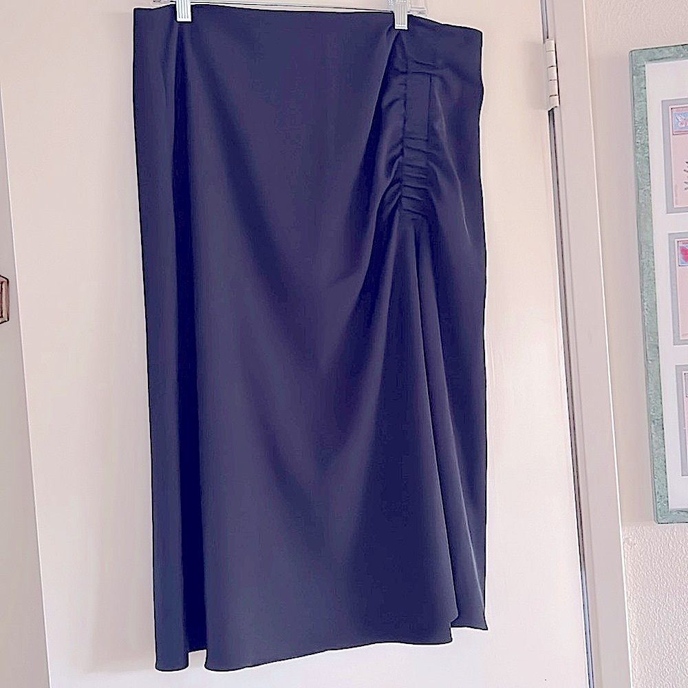NWOT.  DKNY Classic black maxi skirt.  Lightweight A-lined skirt.